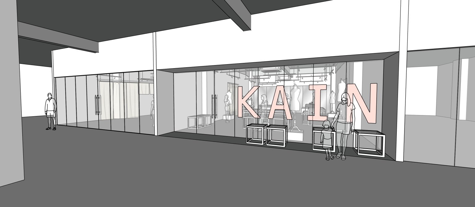 Architectural render of the incubator shopfront with the KAIN sign, mannequins and display plinths behind the glass